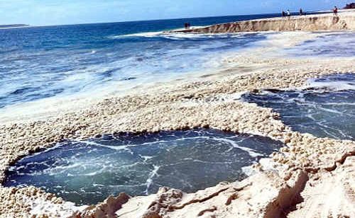 Sand is falling into a mystery hole at Inskip Point near Rainbow Beach. Sand is falling into a mystery hole at Inskip Point near Rainbow Beach.